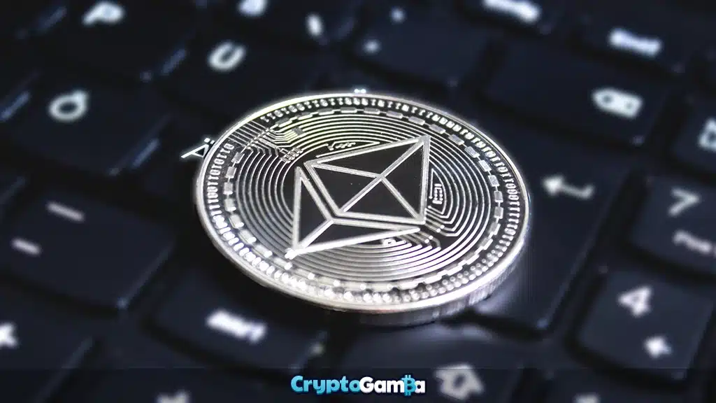Ethereum coin placed on top of a black keyboard