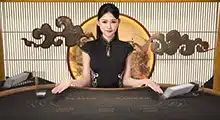 In Bar Baccarat live casino game dealer
